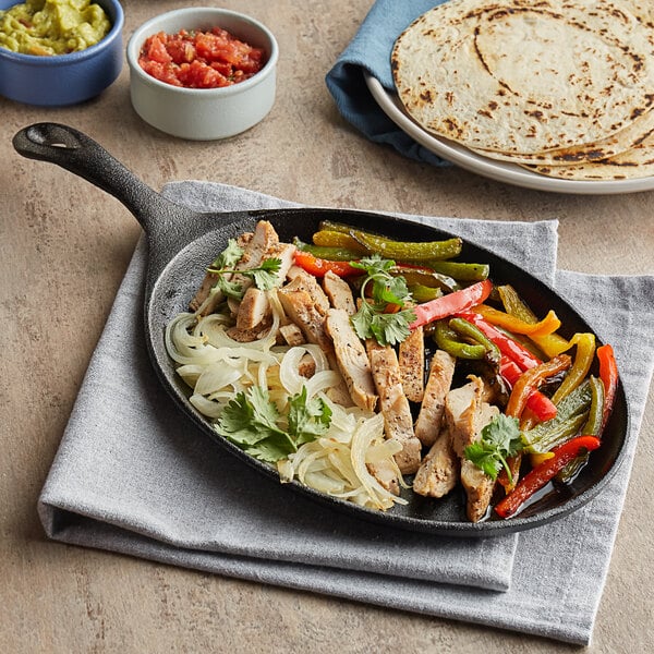 Choice 9 1/4" x 7" Oval Pre-Seasoned Cast Iron Fajita Skillet with Handle