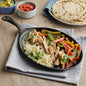 Choice 9 1/4" x 7" Oval Pre-Seasoned Cast Iron Fajita Skillet with Handle